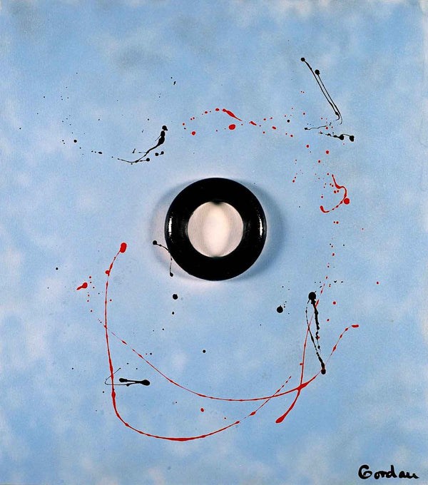 Black ring on baby blue with red spatter.